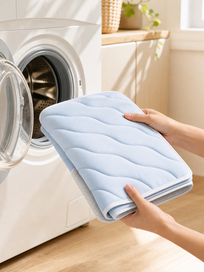 CoolRest thin foldable washable pet cooling mat by a front-loading washer