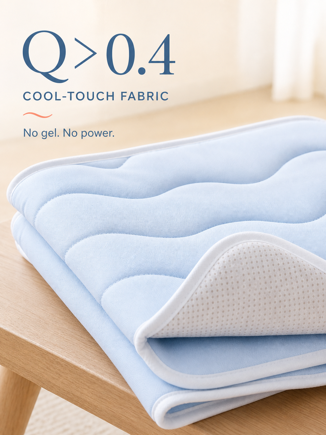 CoolRest Q greater than 0.4 cool-touch fabric with white piping and non-slip underside