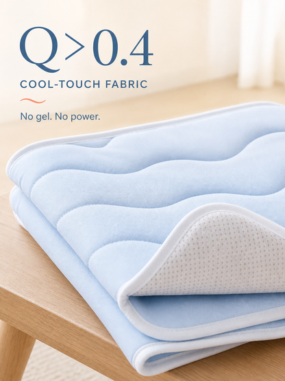 CoolRest Q greater than 0.4 cool-touch fabric with white piping and non-slip underside